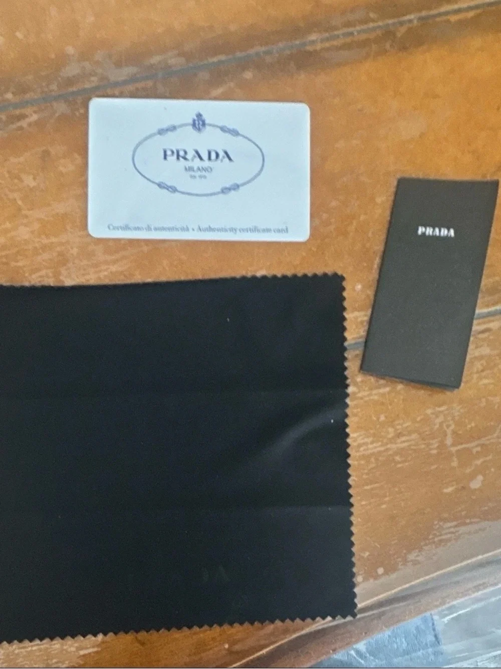 Prada Black Rectangular Sunglasses with Dark Lenses